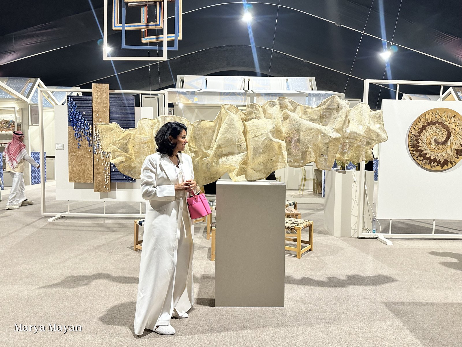 Marya Mayan beside the Fragile installation at the Banan exhibition